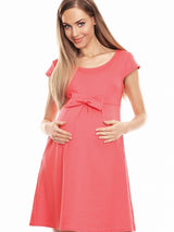 Loose-fitting maternity dress with a front bow and flared skirt