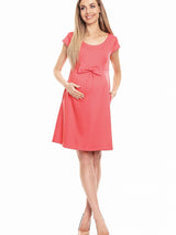 Loose-fitting maternity dress with a front bow and flared skirt