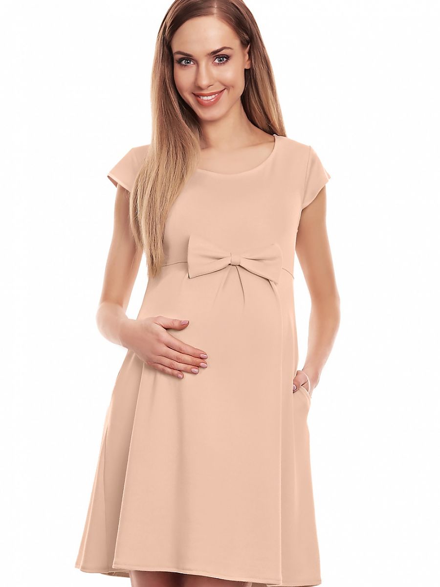 Loose-fitting maternity dress with decorative bow and flared skirt