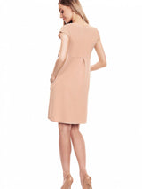 Loose-fitting maternity dress with decorative bow and flared skirt